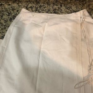 3-$20 Cream Liz Claiborne maxi wrap skirt.